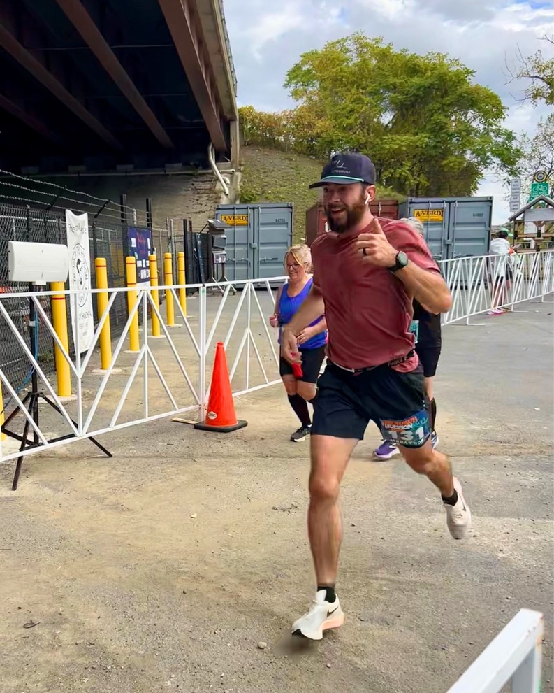 Brenden D. running the Mohawk Hudson Marathon in Albany, NY